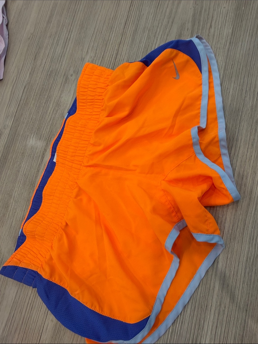 Nike Women’s Orange Athletic Shorts with Blue Panels